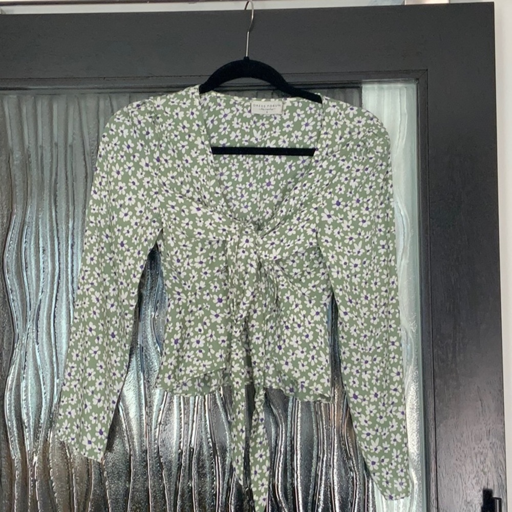 Small floral wrap top.